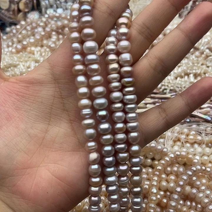 玛瑙/玉髓未镶嵌珠宝半成品一条粉紫珍珠有生长纹