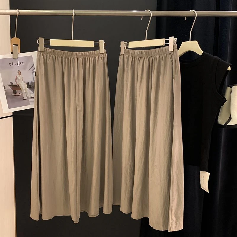 H48中长款半身裙女2025春季新款垂感松紧腰小个子a字宽松大摆伞裙