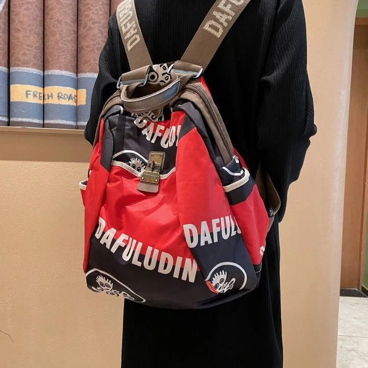 2025通勤帆布旅行双肩包女新款时尚休闲旅游包女士背包牛津布防水