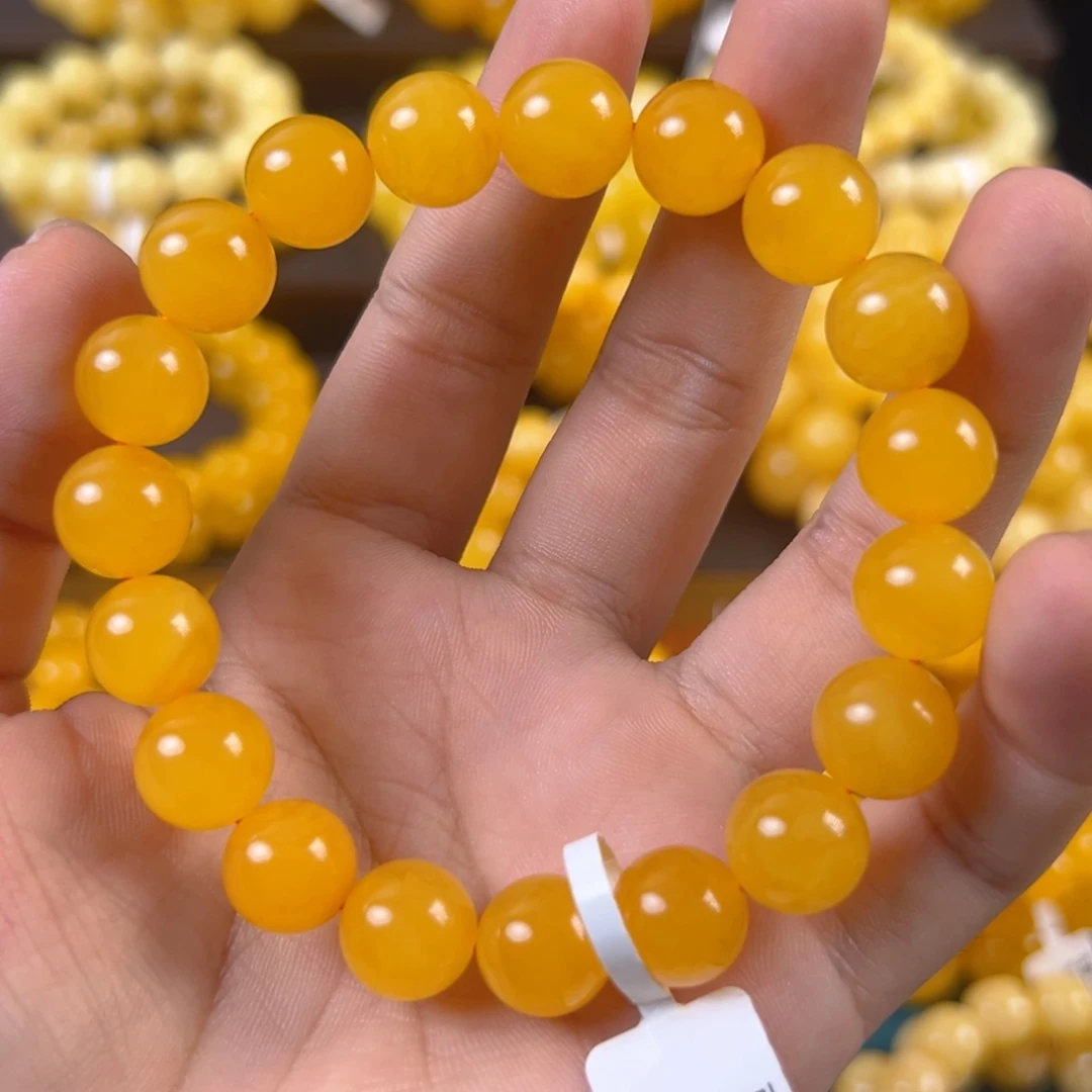 琥珀未镶嵌手串16.86g焦皮同料圆珠11mm tt