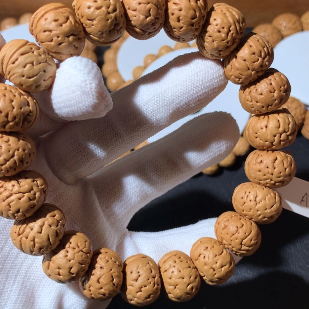 【闪购商品】桃核手串一代树王纽扣17尺寸