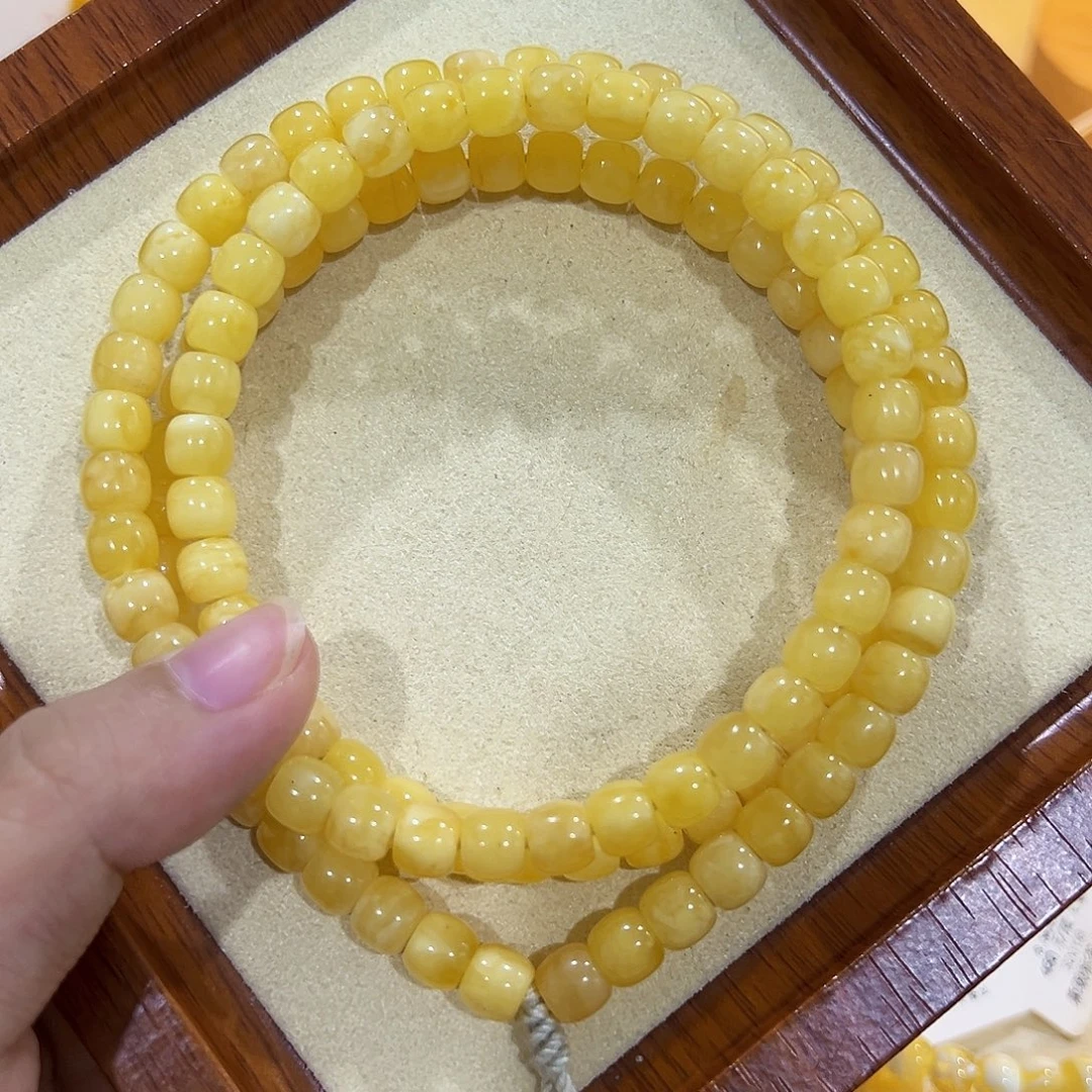 欢***欢未镶嵌蜜蜡手链7m微瑕奶黄老型108