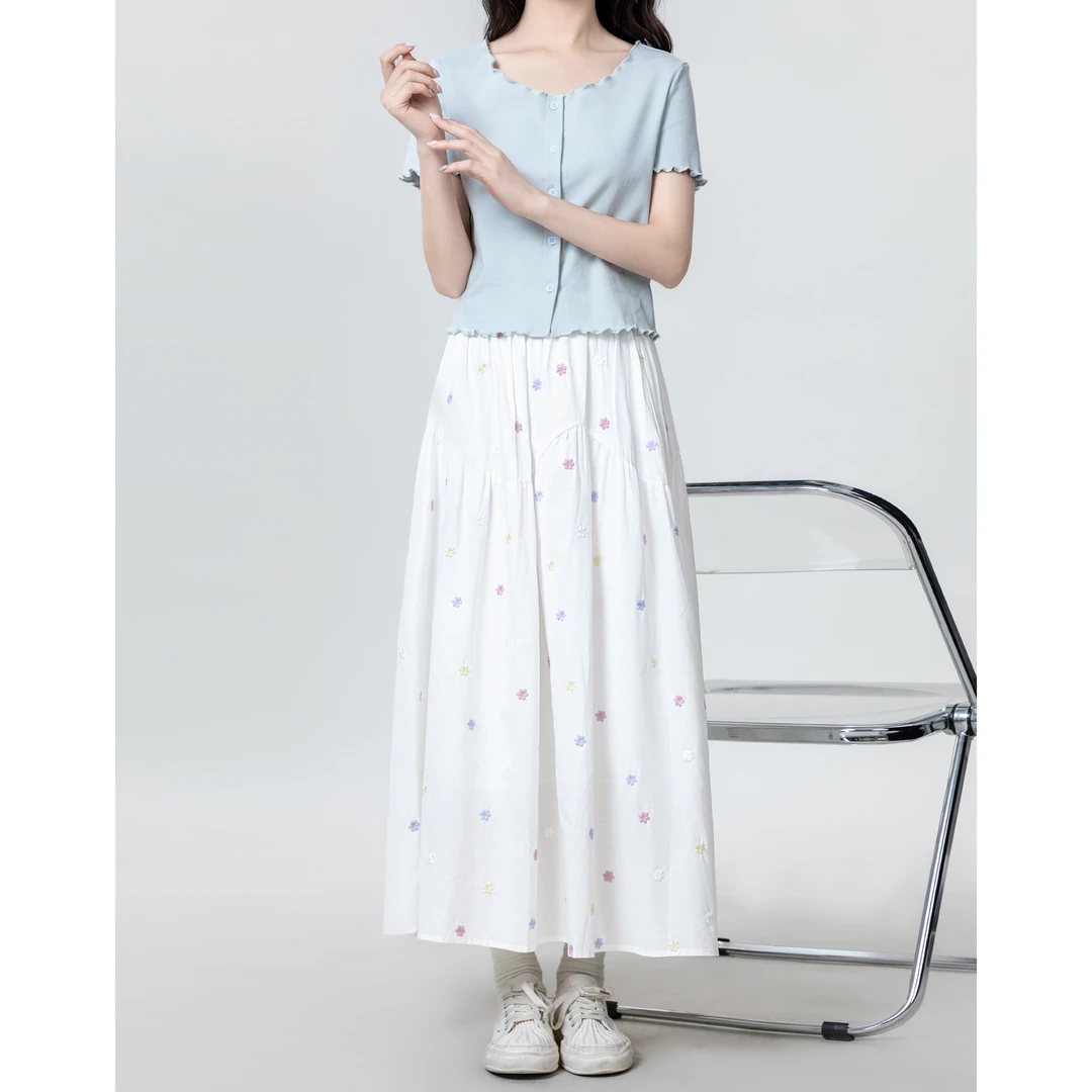 彩色小花白色半身裙女2025夏季新款高腰a字伞裙百搭中长款白裙子