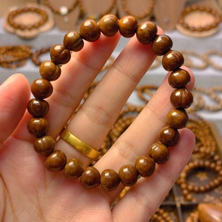 果皮天然库克精挑屁桃8*9单圈手串