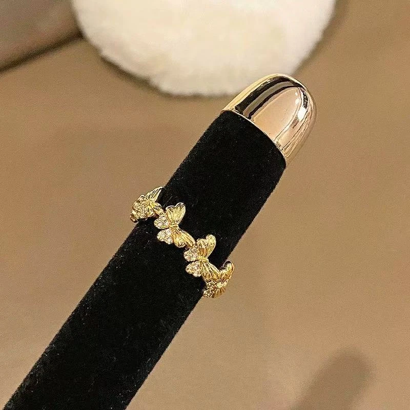 足银戒指 点钻蝴蝶戒指