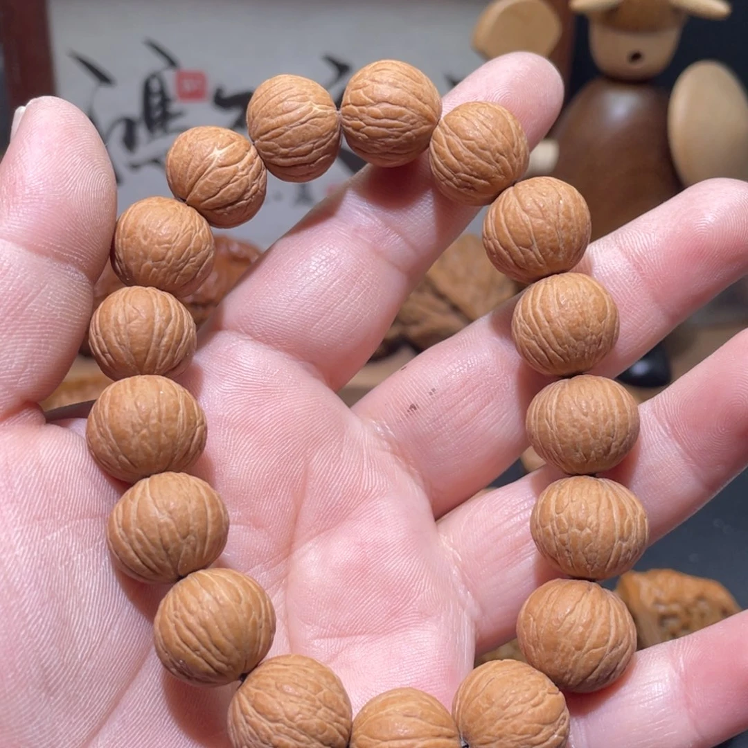 夜***在桃核吊坠猴头凤羽小核桃