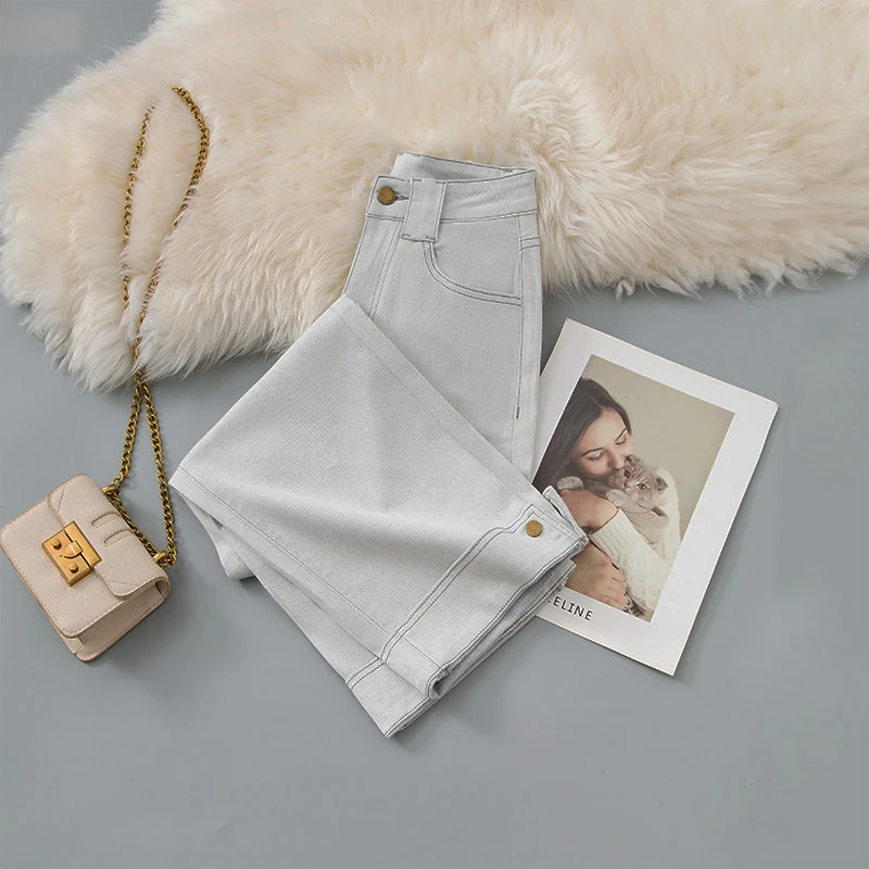 艾尚 【显瘦柔软】设计感时尚新款直筒可翻边开叉牛仔裤面料柔软