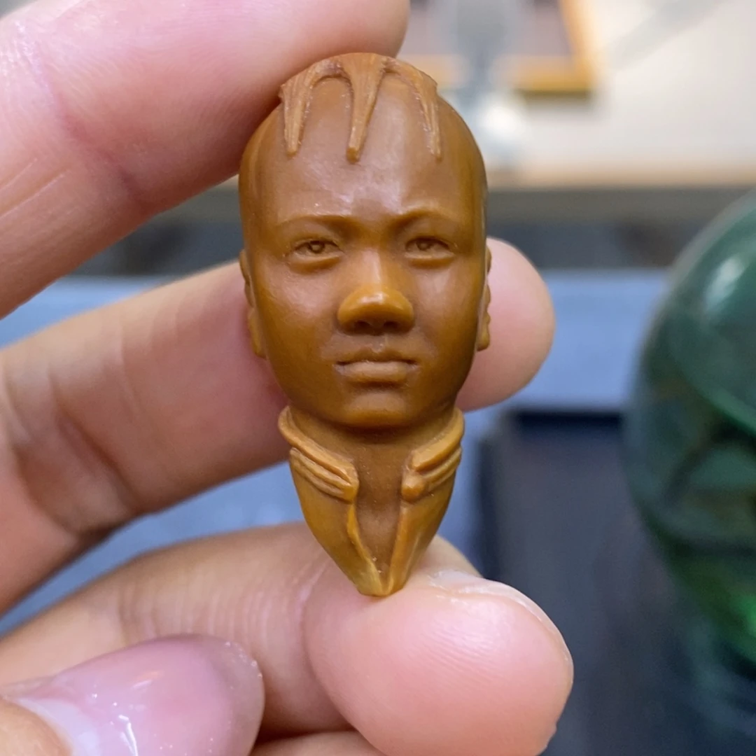 橄榄核吊坠三毛单子
