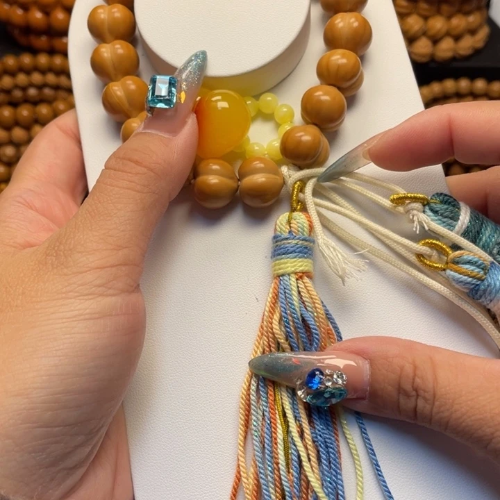 ໑****猴头核桃手串微瑕屁桃加爱心卡环2号流苏