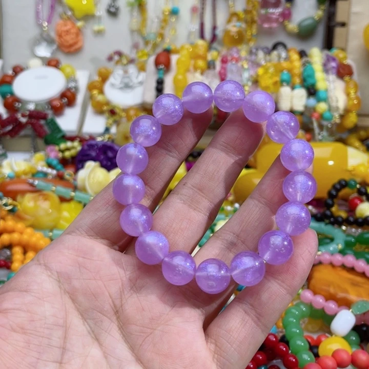 洋**吖67号紫色变色手串