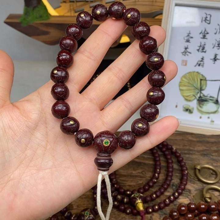 凤眼菩提吊坠12 带钉手持