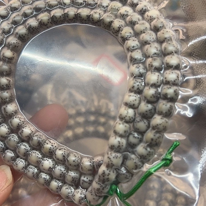 青***洱手串星月菩提海南原生态6/7双留白灰冰