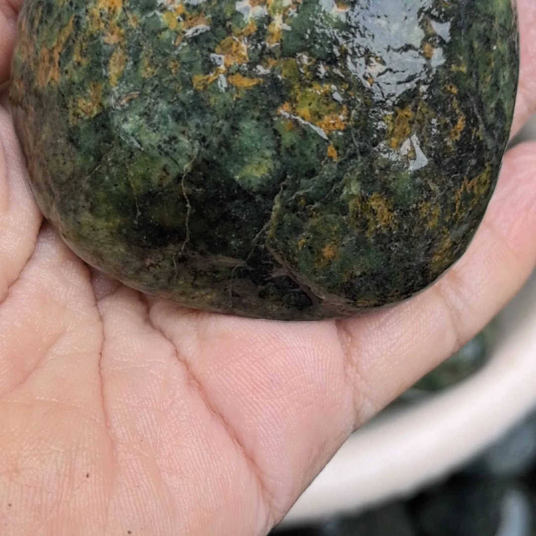 石材善**下藏玉药王石原石手把件一个