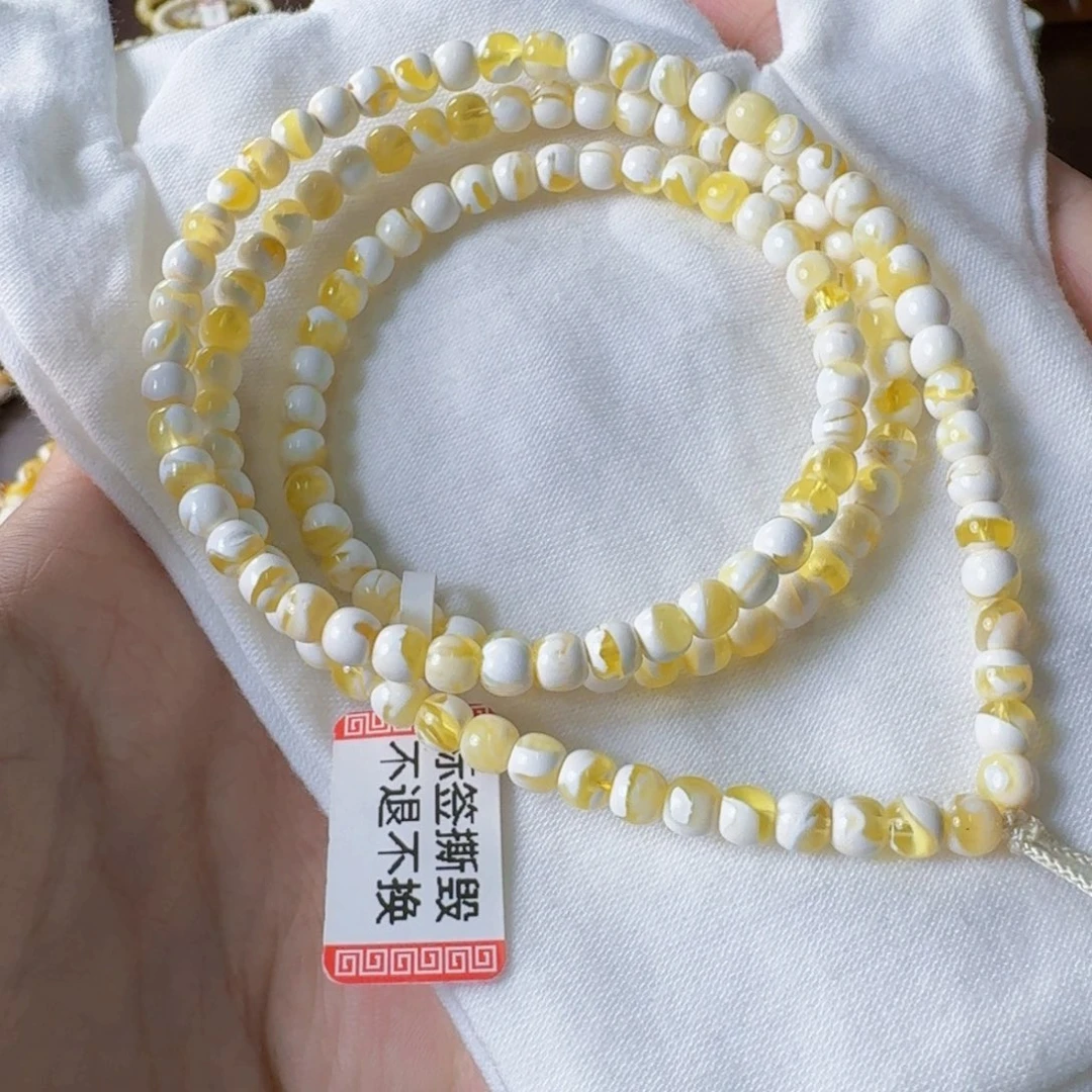 裸石琥珀未镶嵌5mm金漆白溶洞