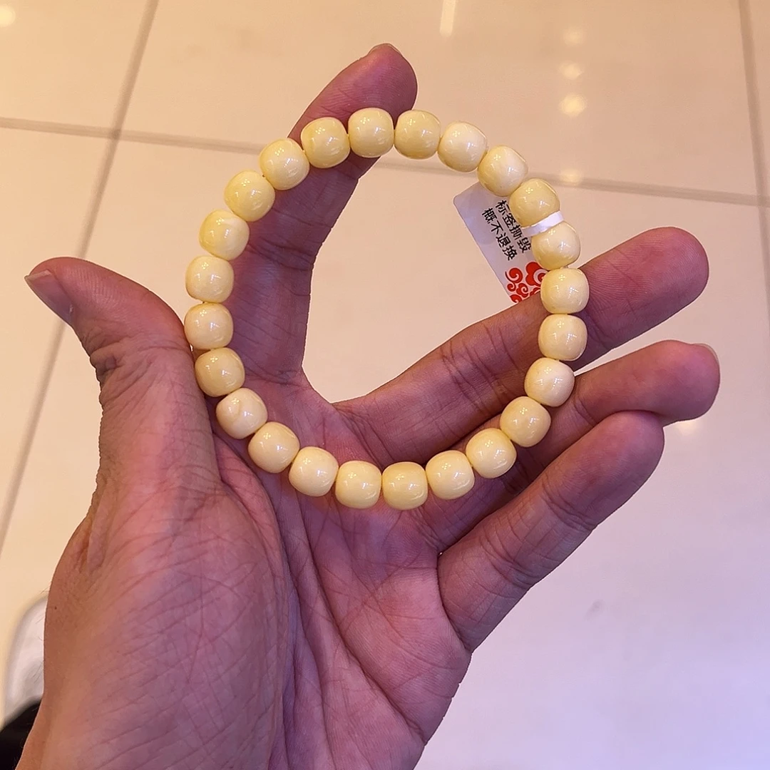 爱***豆手串蜜蜡未镶嵌奶浓白9mm*8.5mm精工高桩