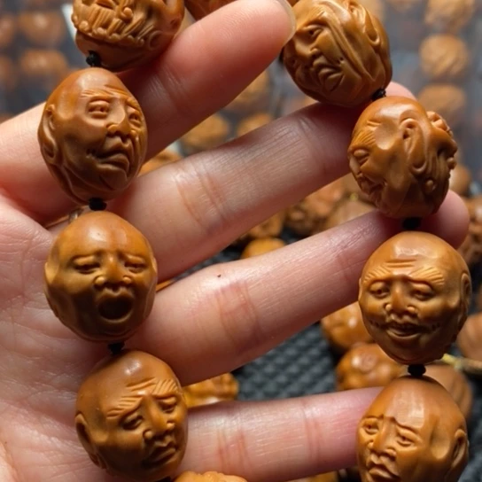 橄榄核吊坠老须派