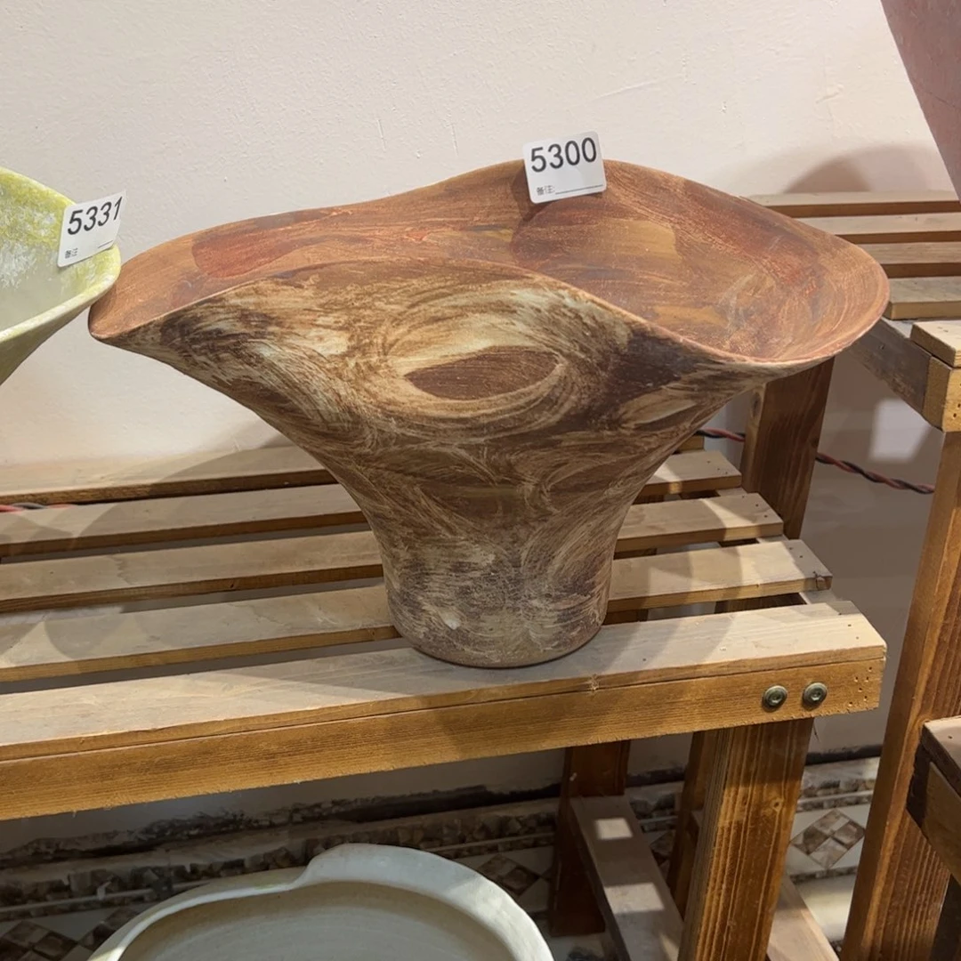 瓷片5300打孔的高21瓶口不规则的，