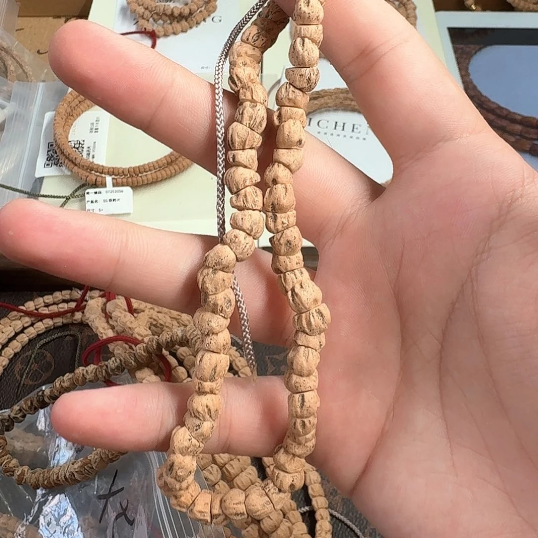 乐***乐柏香籽/百香籽吊坠大肠手持
