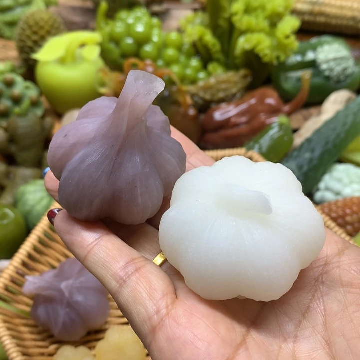 蛇纹石玉手把件未镶嵌三**汇