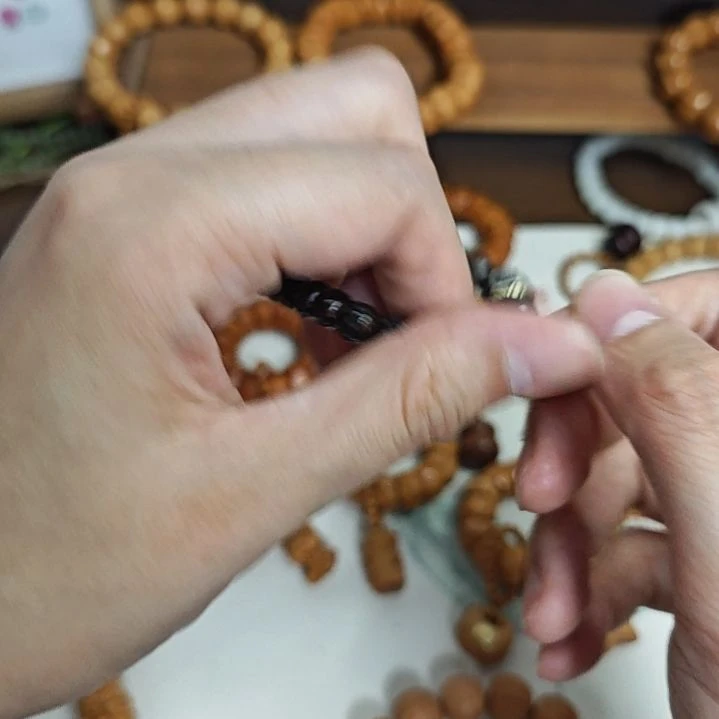 橙***子天然椰蒂单圈手串