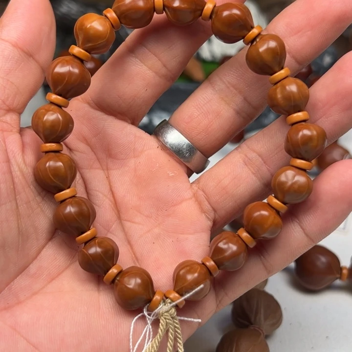 金***烊橄榄核吊坠橄榄核手串11*13无修