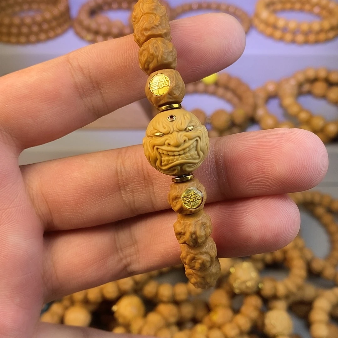 昊***昊猴头核桃手串全品游龙 抓钱僧