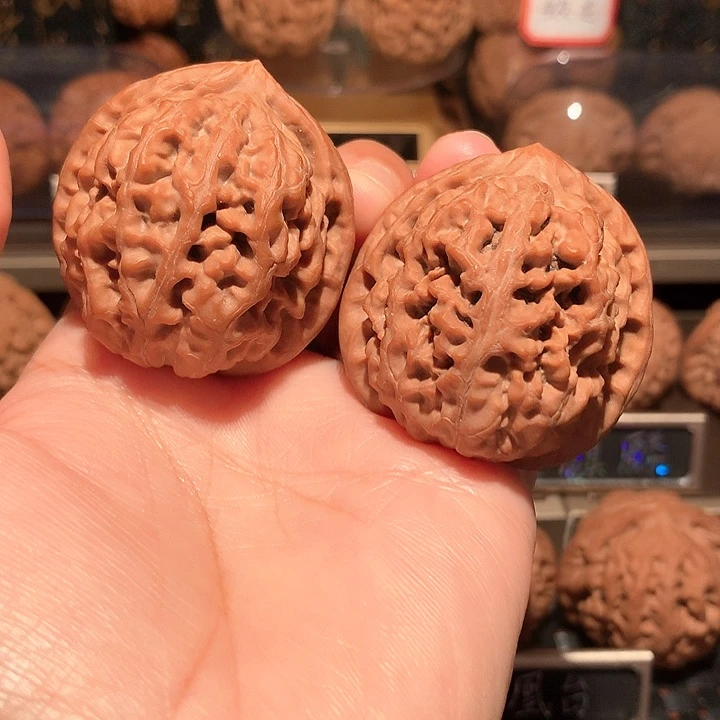 _***。文玩核桃把件凤凰台