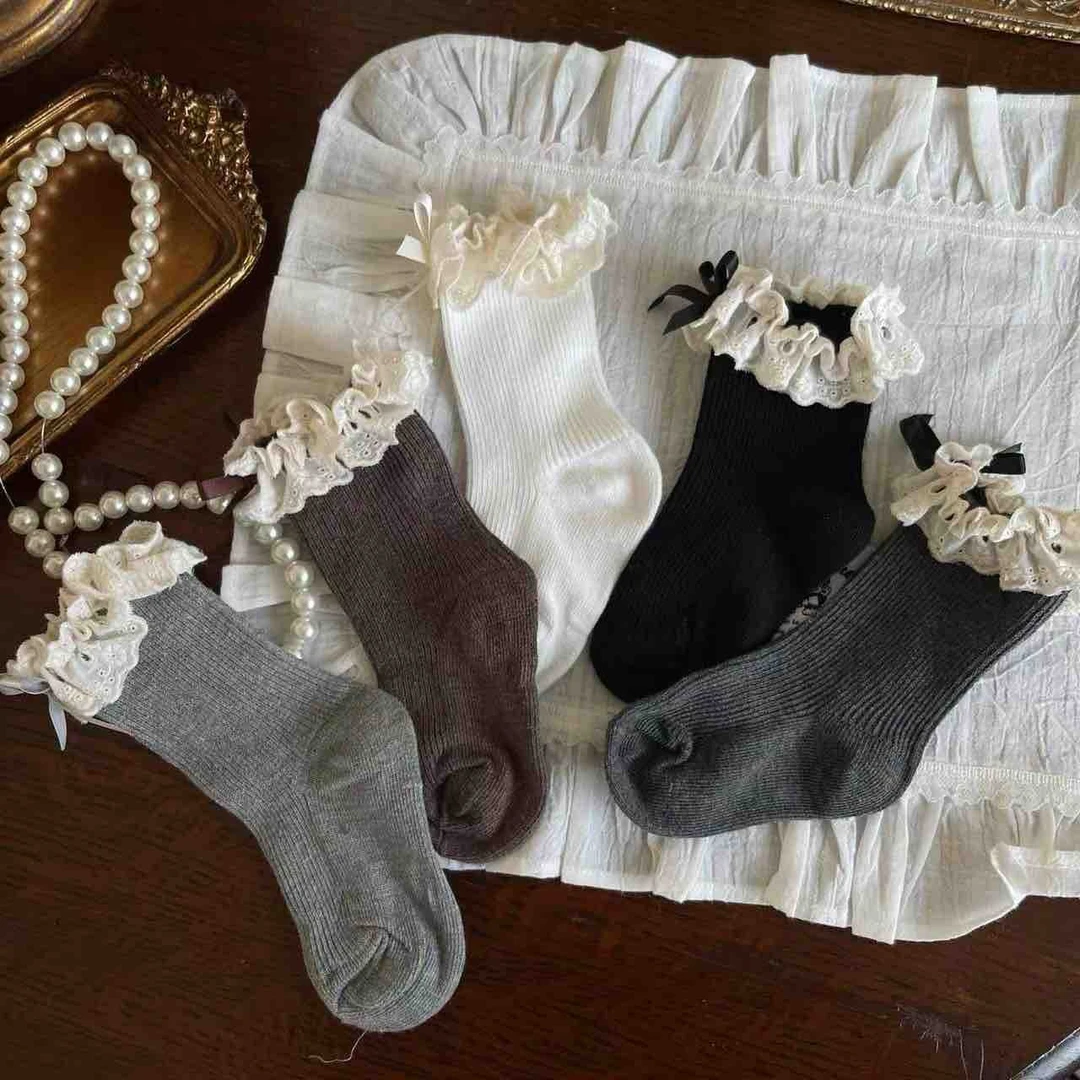 TW2285奶霜花边加蝴蝶结袜子