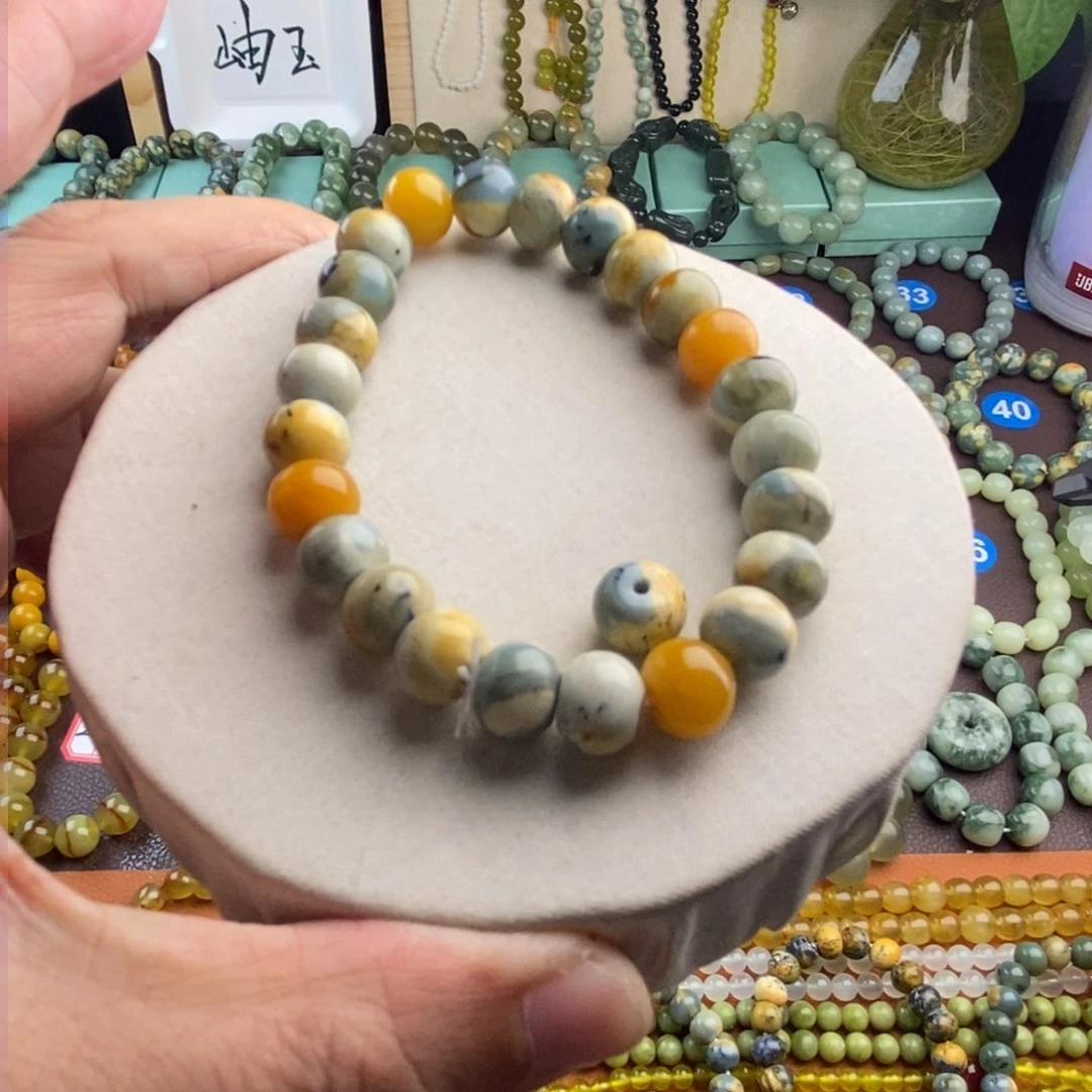 蛇纹石玉手串未镶嵌菩**灯