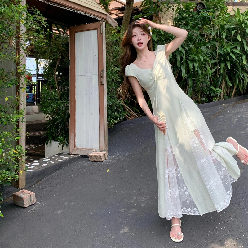 法式蕾丝拼接薄荷绿连衣裙女夏2025新款独特漂亮别致爆款显瘦长裙