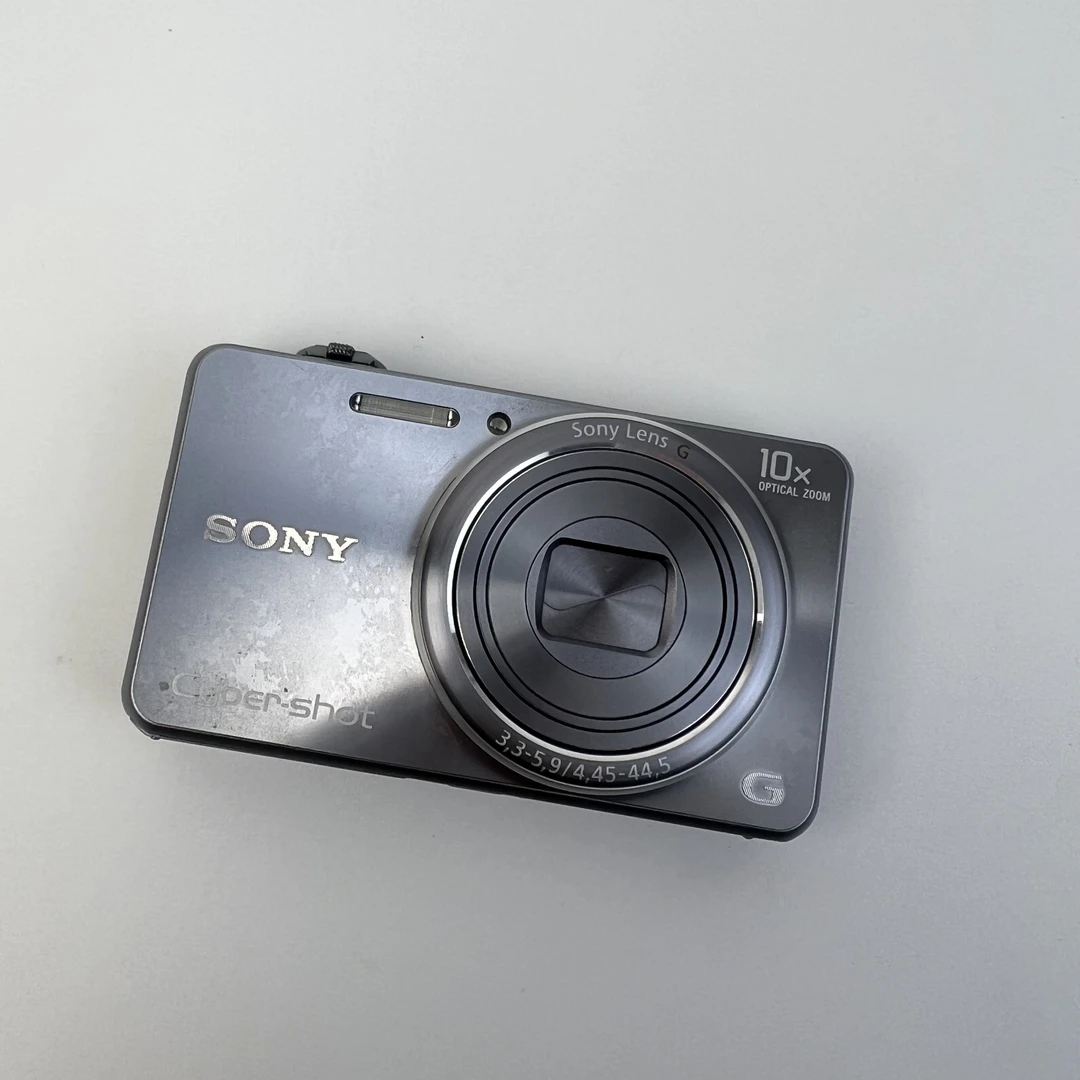 95新 Sony/索尼 WX100银色1820w像素10倍小长焦奶油肌出片 冷白