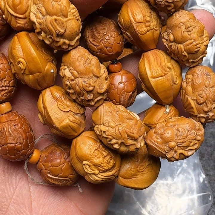 橄榄核手串你是谁