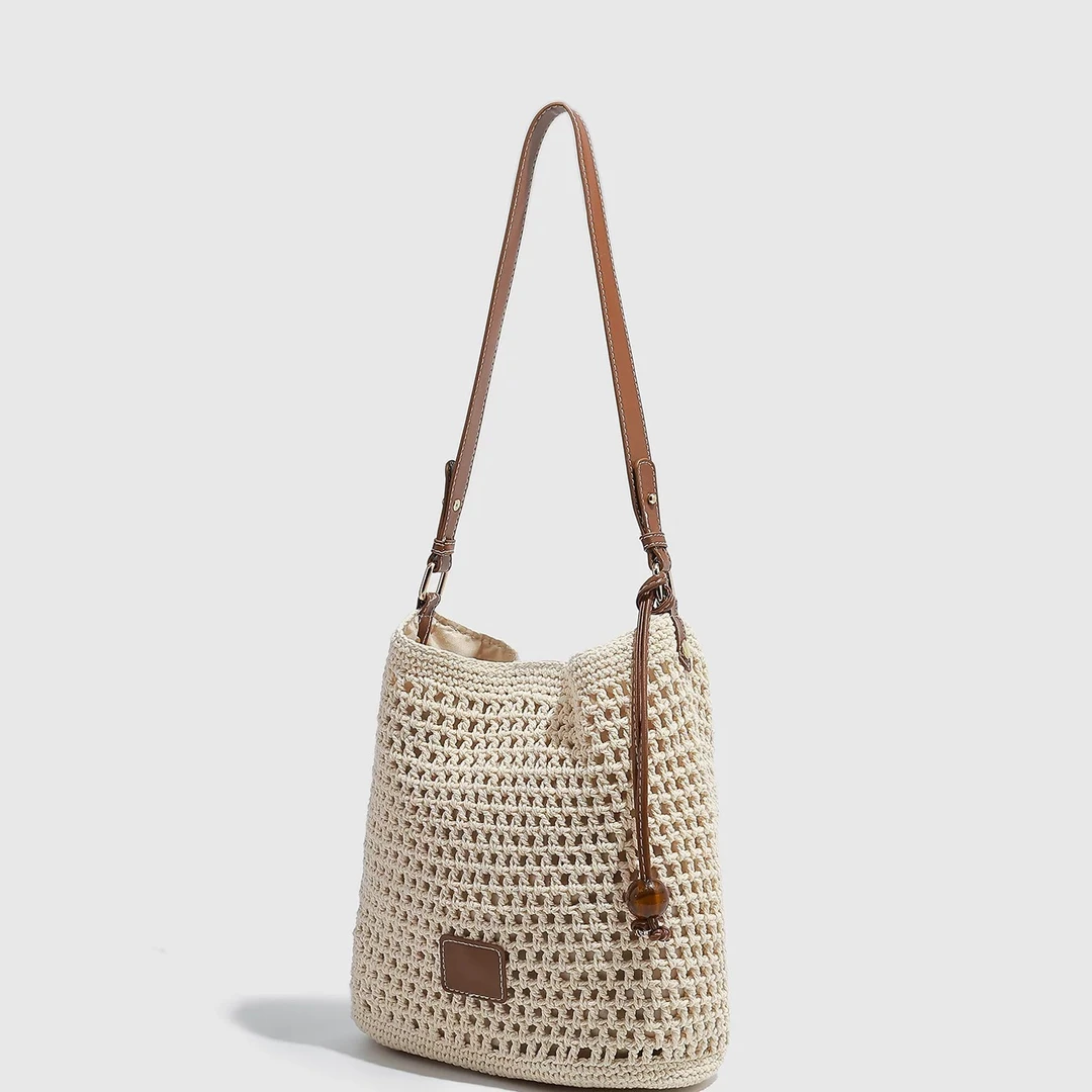 新款钩编红珠单肩水桶包，棕色皮件点缀休闲百搭女包草编包编织包