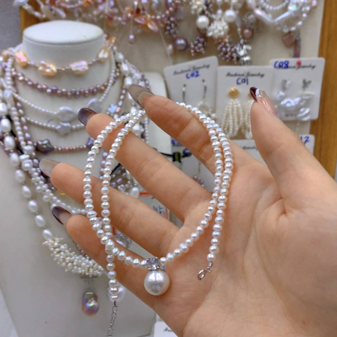 淡水珍珠耳饰银S925镶嵌不***子