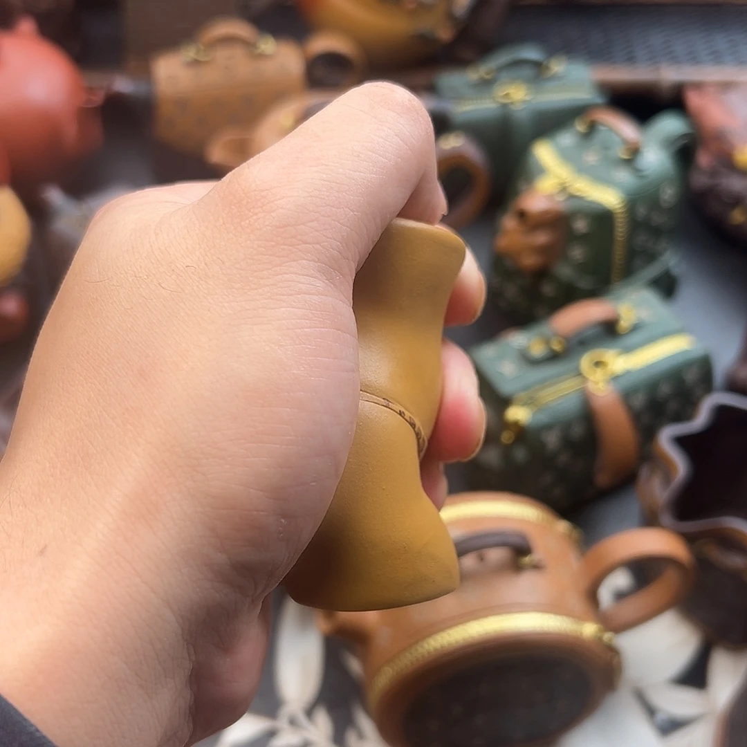 紫砂茶壶杯子的味道还真滴