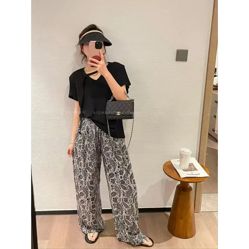 邹先森2519-28夏季新款时尚气质显瘦腰果花阔腿裤宽松