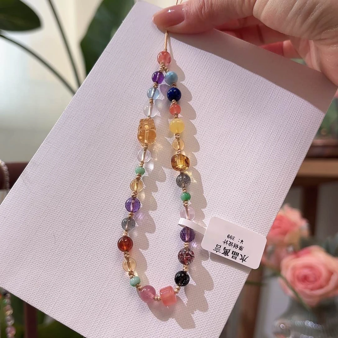 水晶手绳未镶嵌橙***?手机链