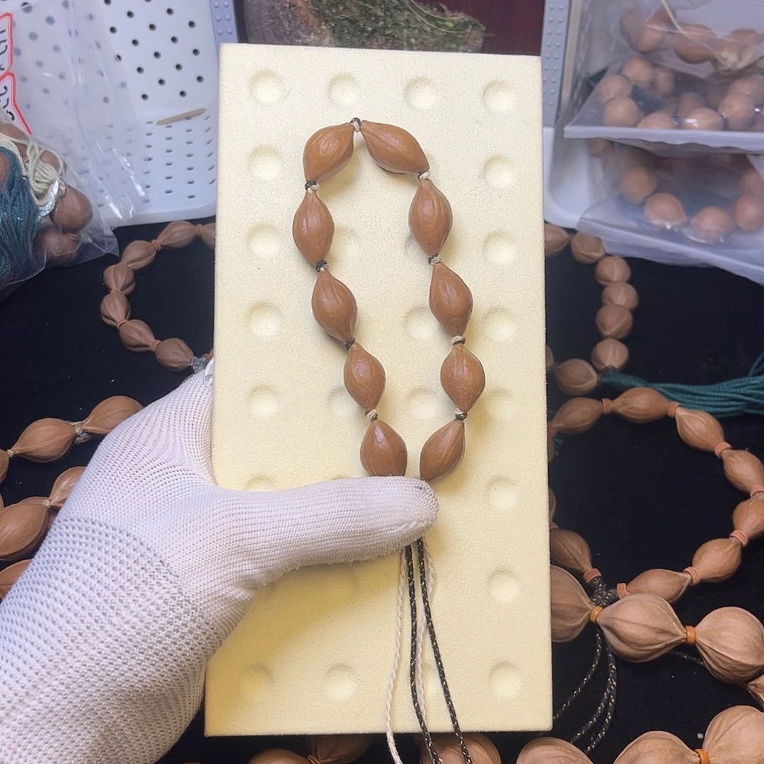 橄榄核手串/手链1.5左右 小红料