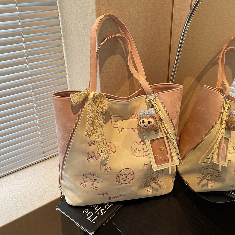 艾米兔女包2025新款简约大容量双肩包百搭休闲小众通勤单肩托特包