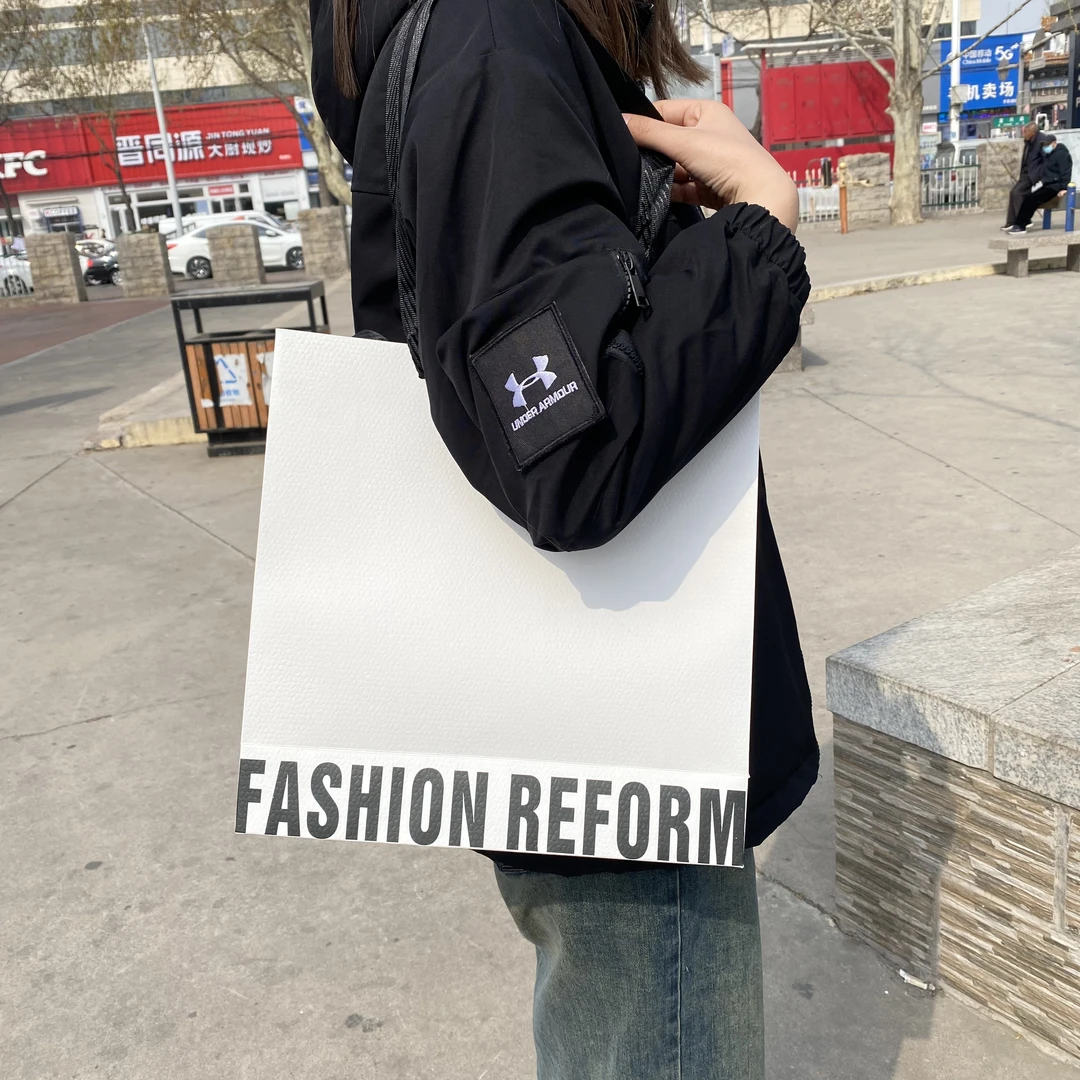 高质包装白卡纸服装店买手店化妆品店购物袋时尚大气简约