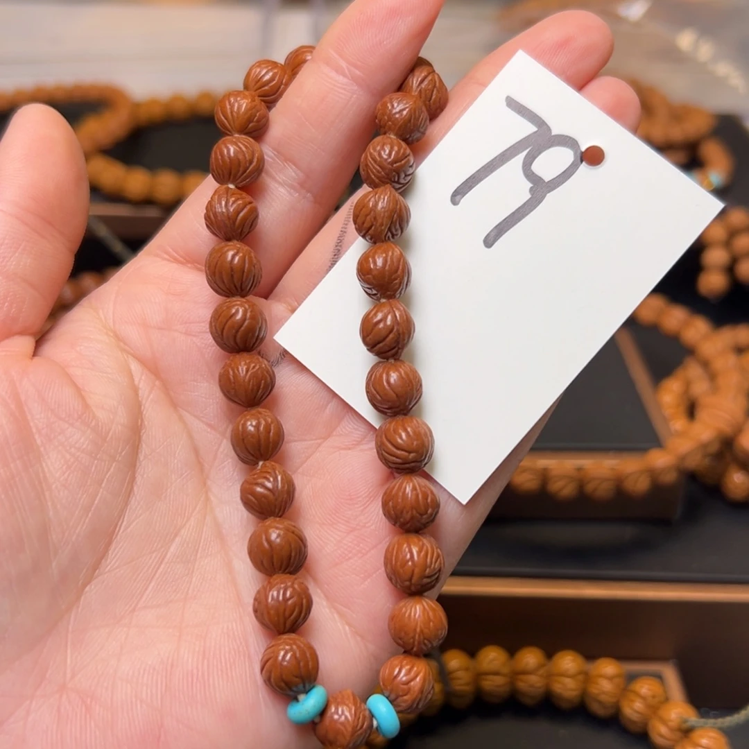 文玩核桃把件秦岭龙纹桃核9小奶豆手持