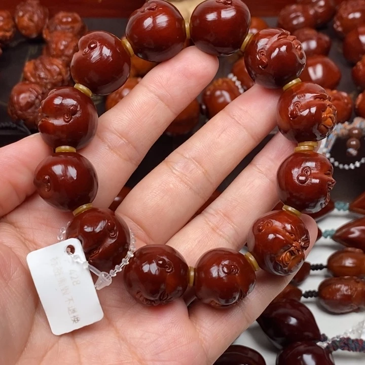 吊坠橄榄核世****闯8877666655