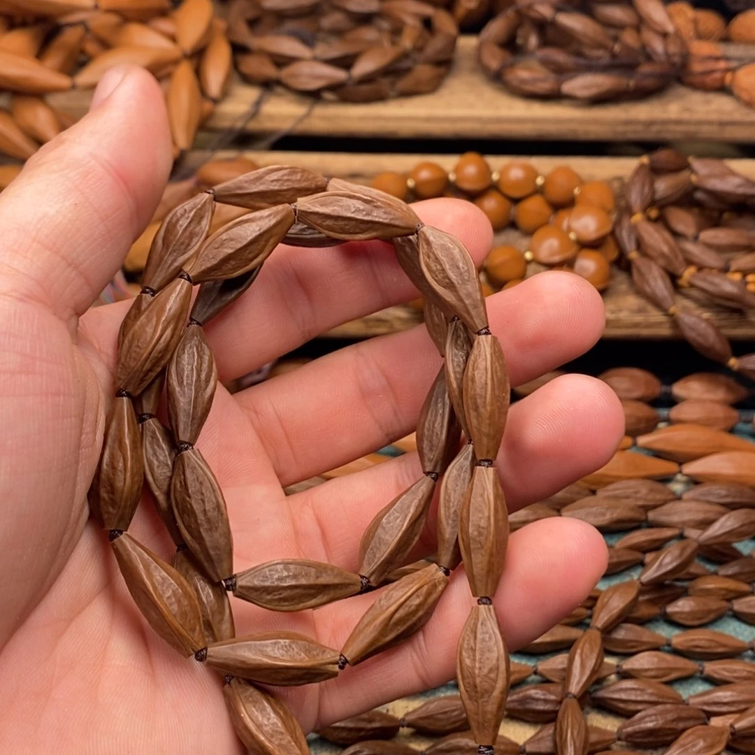 橄榄核手串/手链天*渡0.8。 长的核