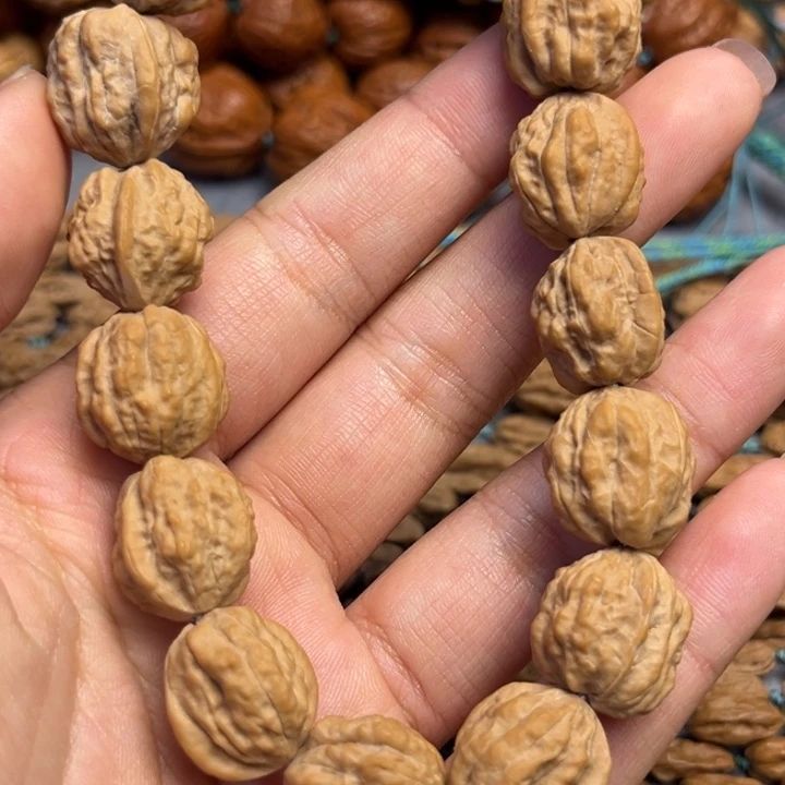 蓝***湾吊坠桃核嵩山蛤蟆头异形籽