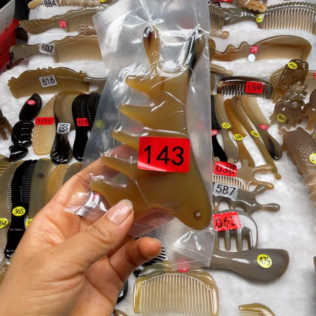 颖***子牛角梳福利款梳子