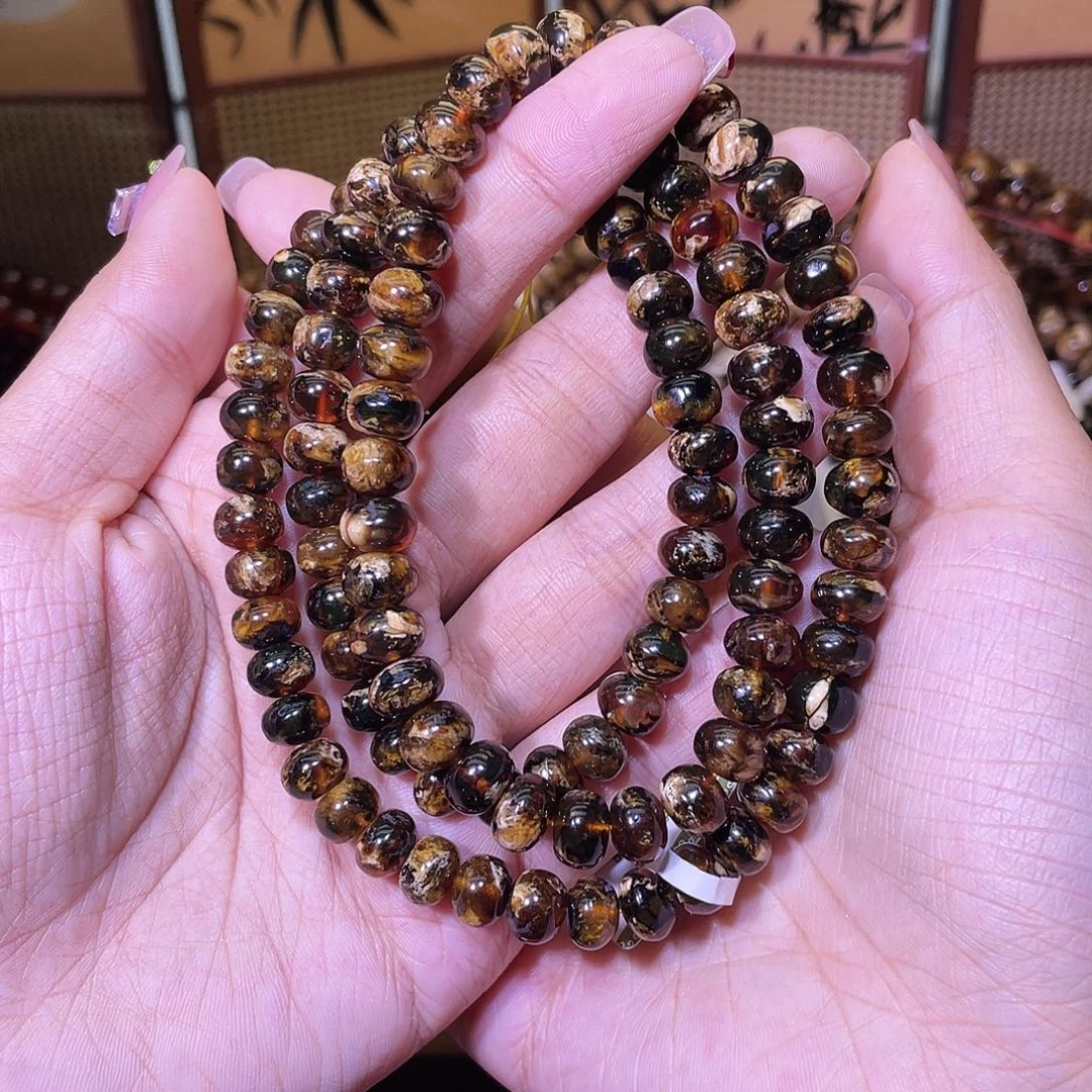 琥珀未镶嵌裸石抚顺琥珀8+深底色溶洞