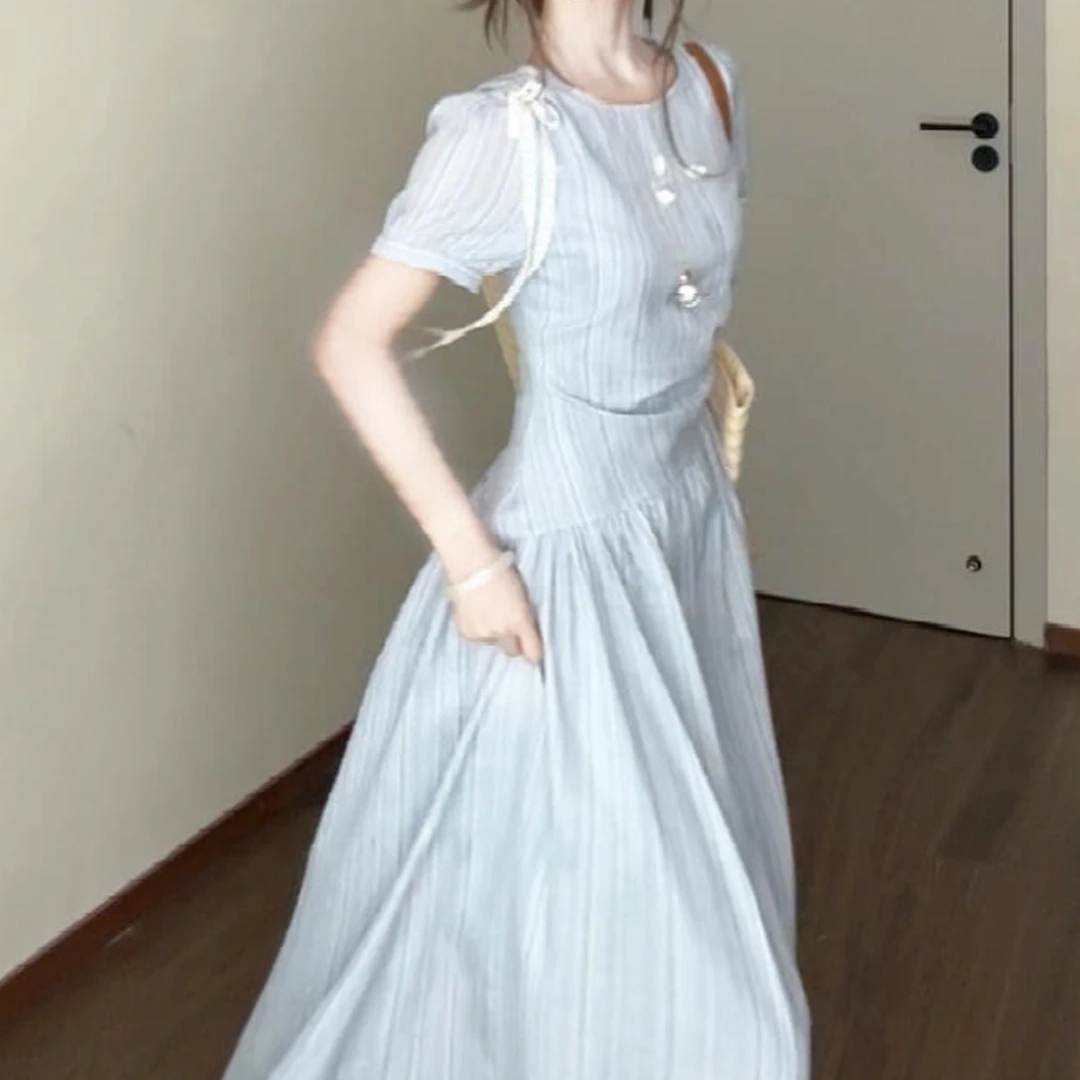 蓝色连衣裙子女夏季2025新款今年流行爆款海边度假掐腰长裙5129