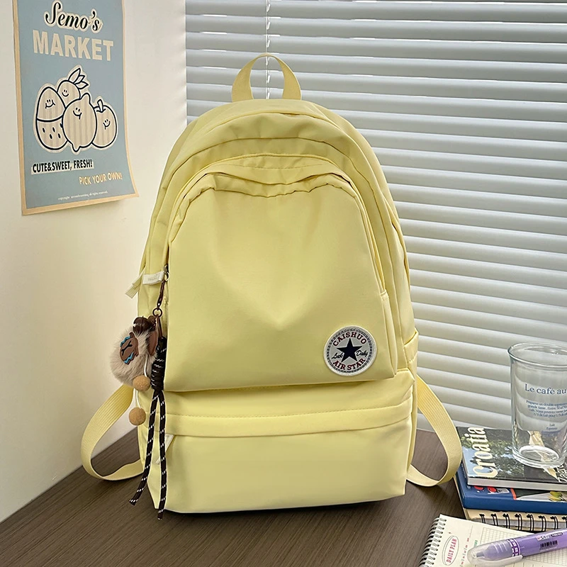 简约百搭大容量男女学生书包旅行双肩包休闲运动防水耐磨电脑背包