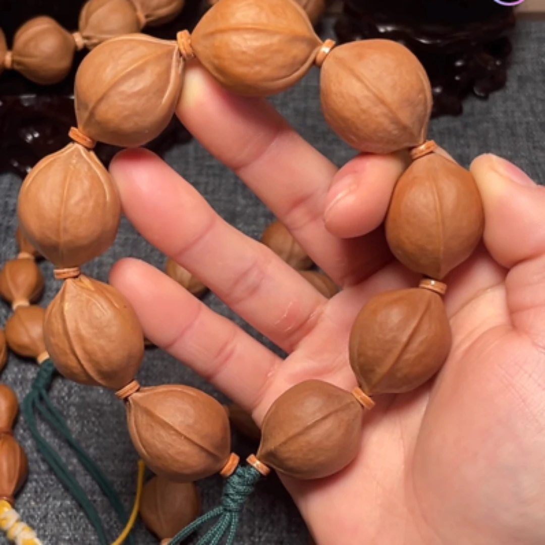 2229头货梅林铁三花橄榄素核原皮手串