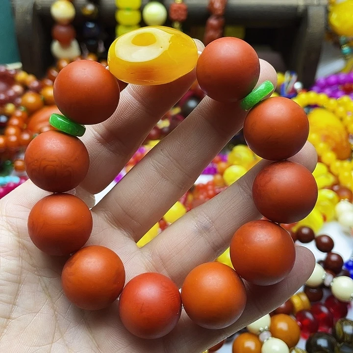 树脂制品64号橘色手串